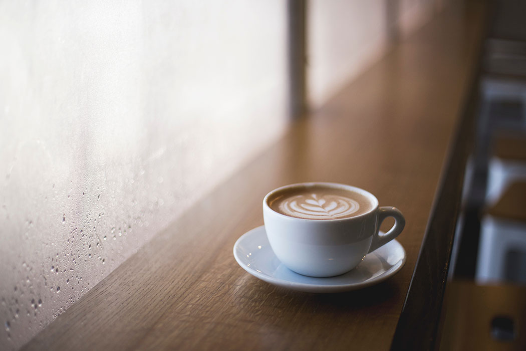 Cup Of Coffee On The Window Sill